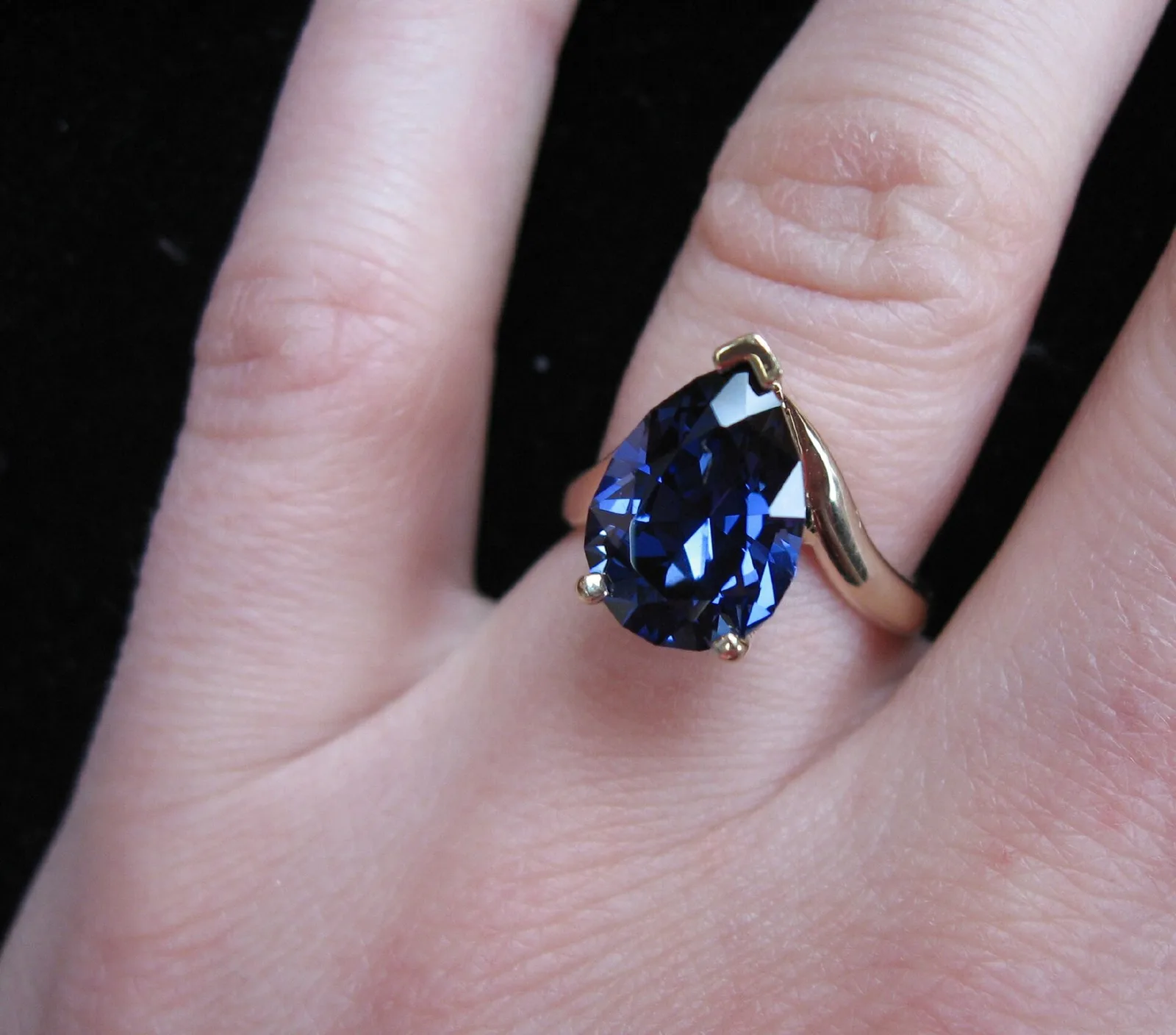 A sapphire and diamond cluster ring