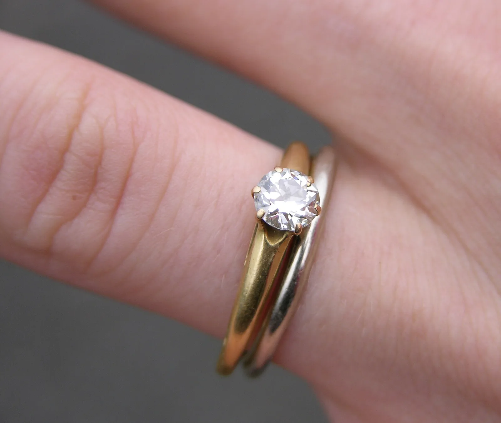 A platinum engagement ring and matching band